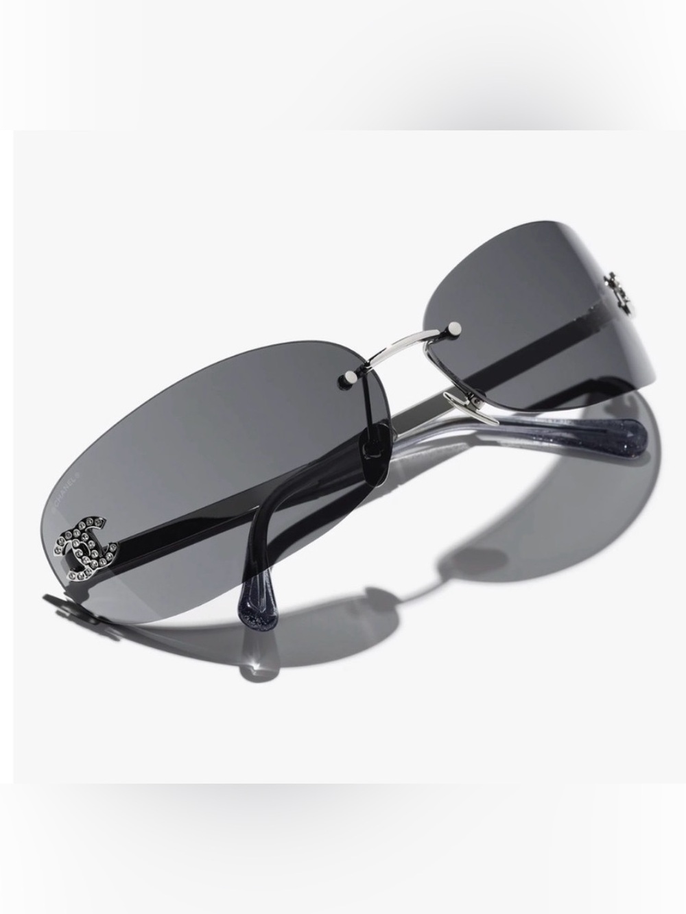CHANEL Men's Rimless Sunglasses in Dark Gray with Silver Accents